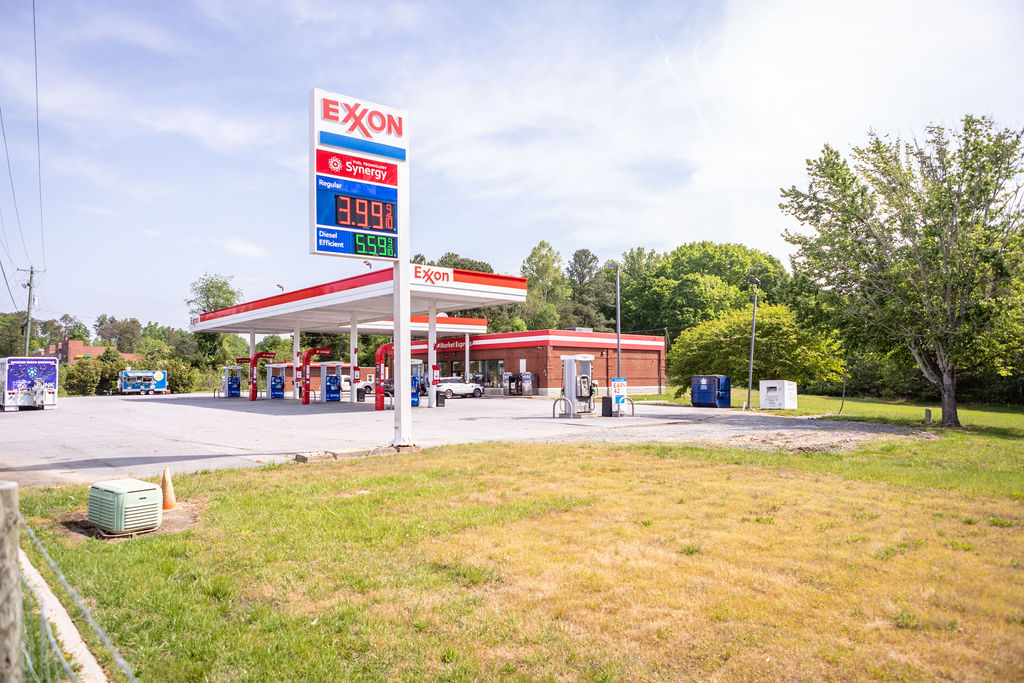 Wide angle shoot of Exxon gasoline station and convenience store.