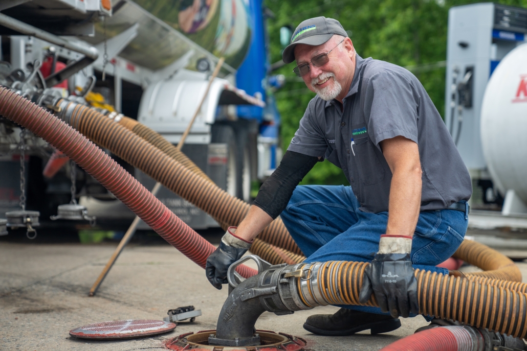 Fuel technician delivering fuel to a commercial business.