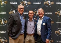 Posing for a photo at Hutchens 50th Anniversary Event