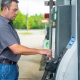 man at the gas pump